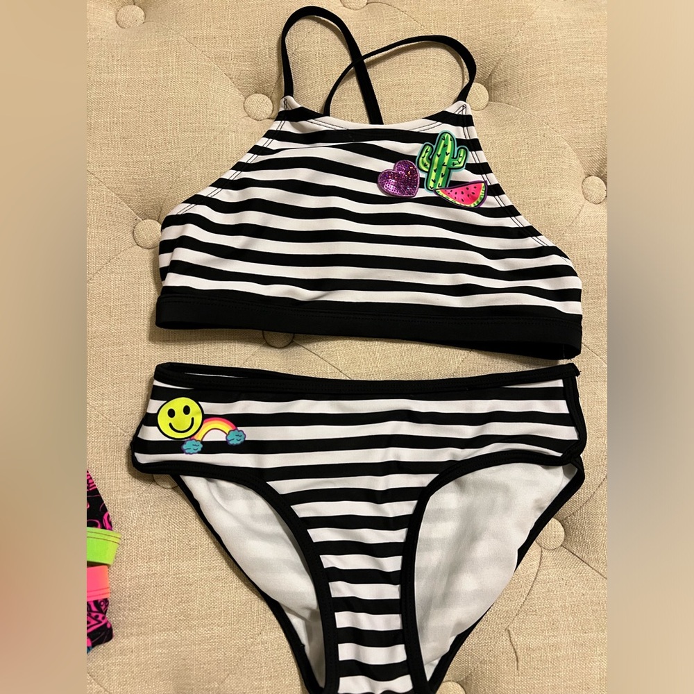 Justice Bikini with smily face. Black and white striped.